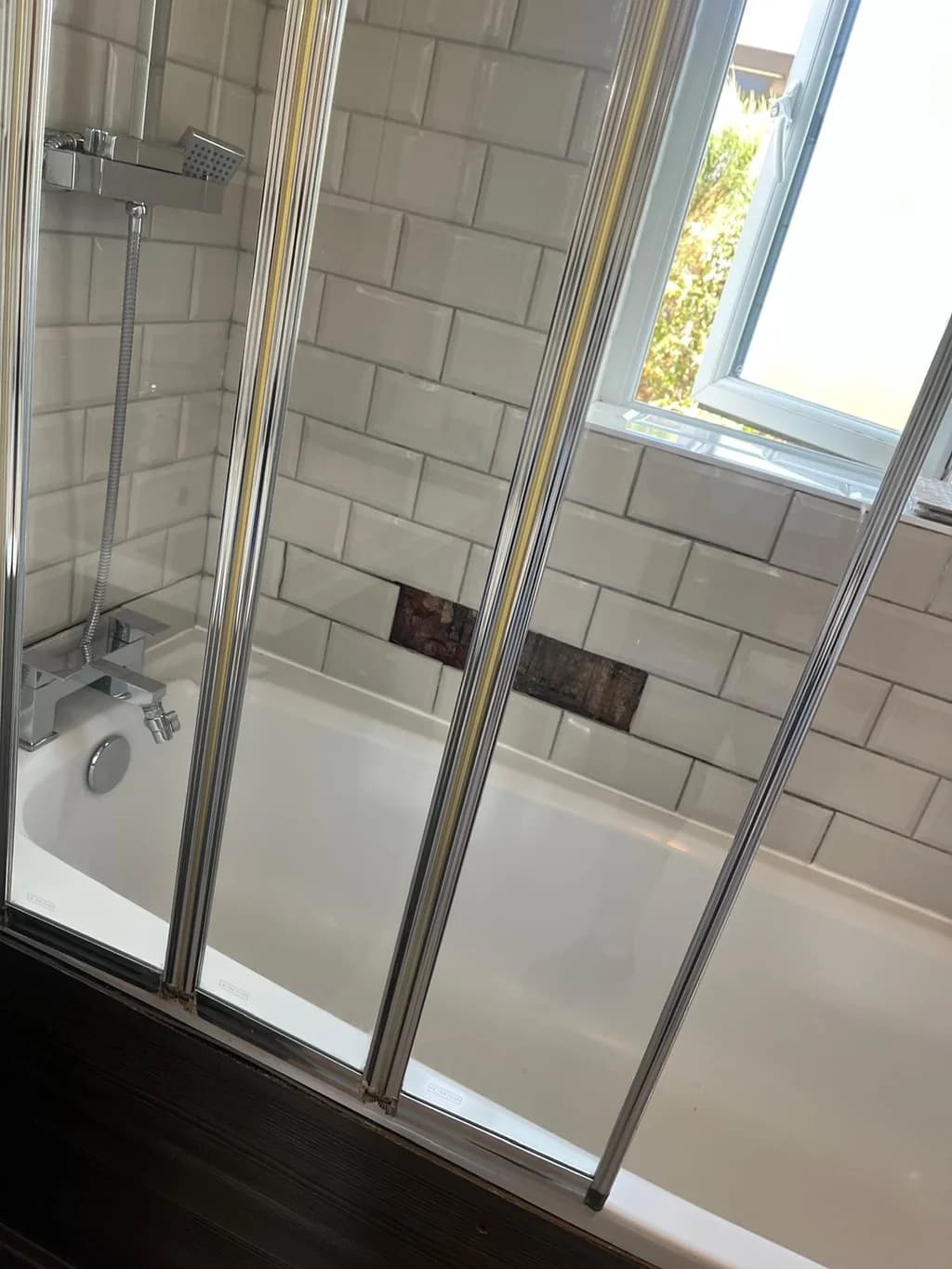 Folding bath shower screen clear after limescale removal