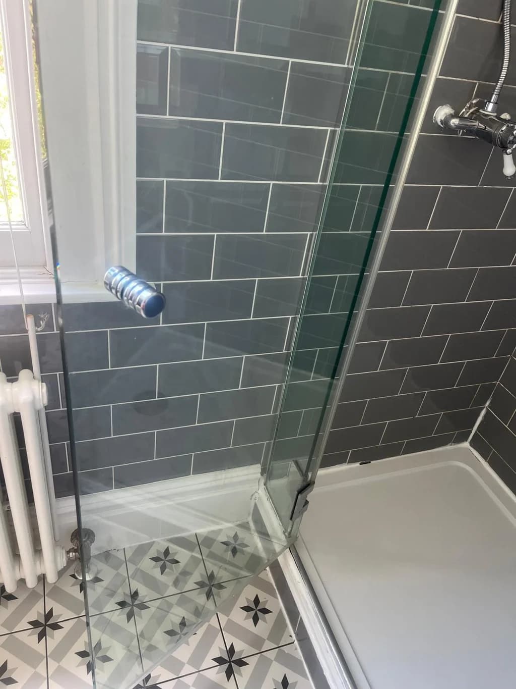 Shower screen restoration — glass panel crystal clear in Woodford